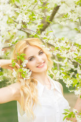 Fototapeta premium Spring portrait of a beautiful young blonde
