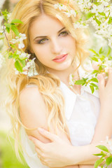 Spring portrait of a beautiful young blonde