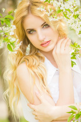Spring portrait of a beautiful young blonde