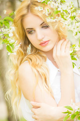 Spring portrait of a beautiful young blonde