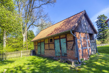 Fototapeta na wymiar half timbered house under clear blue sky
