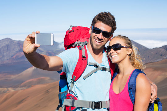 Couple Taking a Photo of Themselves with Phone