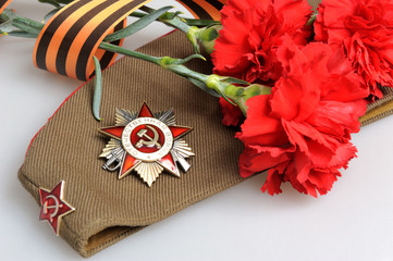 Military cap, order of Great Patriotic war, red flowers tied by