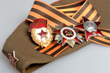Military cap with Saint George ribbon, orders of Great Patriotic
