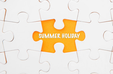 Fototapeta premium Missing piece of puzzle revealing the SUMMER HOLIDAY words