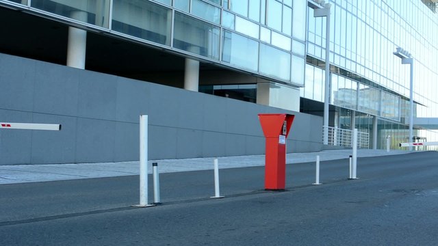 gate on the road in front of building