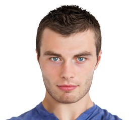 Obraz premium Serious young man looking at camera