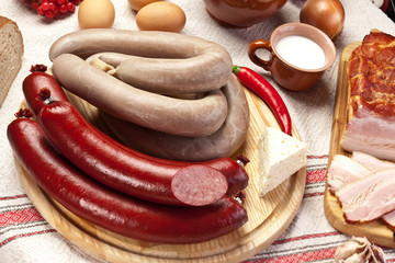 Home-made sausages on the cutting board.