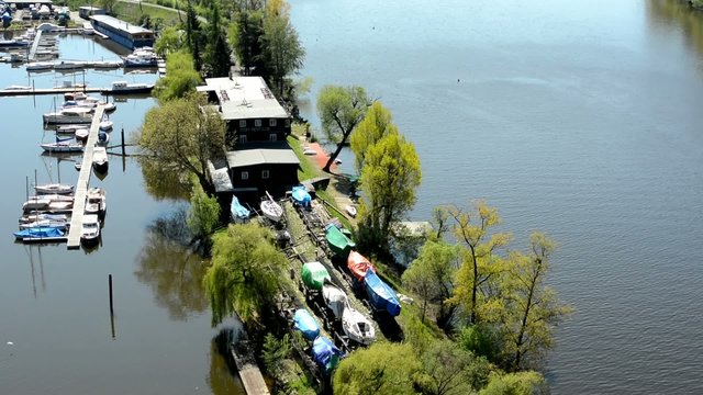 Boat dock with the river Vltava
