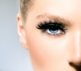 Beauty makeup for blue eyes. Part of beautiful face closeup