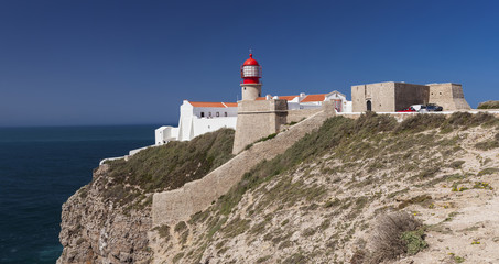 Fototapeta na wymiar Fortress and lighthouse of St.Vincent Cape in Sagres, Portugal.