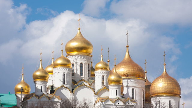Clouds over gold domes of Annunciation Cathedral in the Moscow K