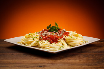 Pasta with meat, tomato sauce vegetables