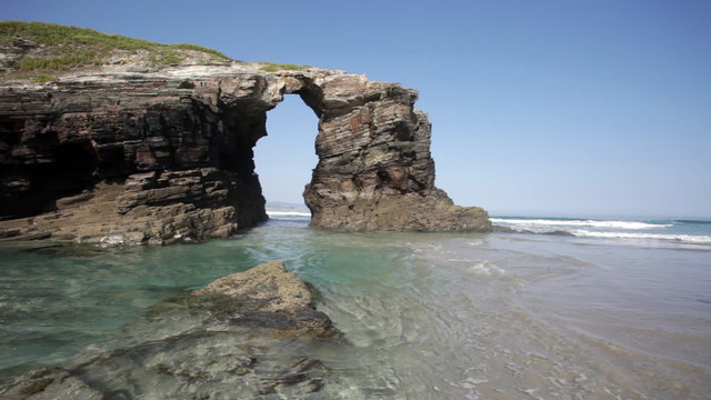 Inflow beginning on Playa de las Catedrales, Spain