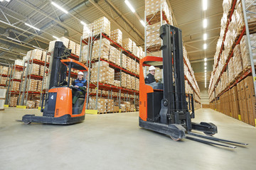 warehouse workers in storehouse