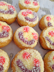A lot of donut and strawberry jam