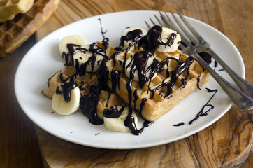 Waffles with chocolate and banana