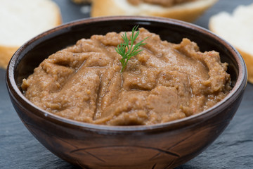 pate of chicken liver and roasted peppers in a bowl, close-up