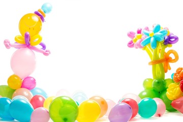 Figures made from colourful balloons isolated on white