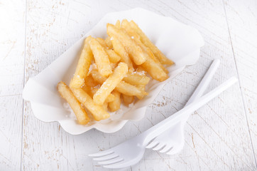 french fries and white paperboard container