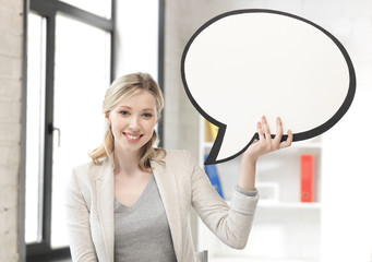 smiling businesswoman with blank text bubble