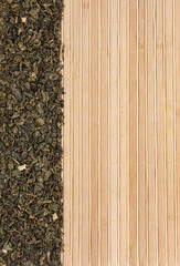 Dried  green  tea  on a bamboo mat