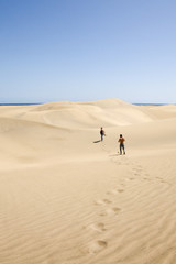 Fototapeta na wymiar Sand dunes on the beach in Maspalomas.