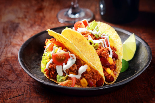 Delicious spicy tacos with meat and vegetables