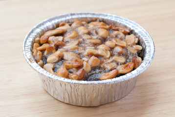 Close up image of walnut toffee cake