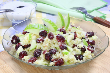 Millet with apple, cranberries and sugar