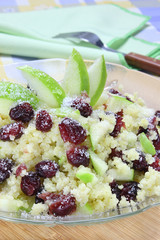 Millet with apple, cranberries and sugar