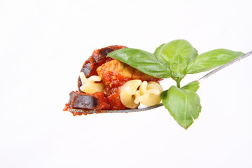 Fusilli pasta with pork & eggplant sauce, eaten with a fork