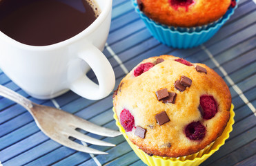 Delicious breakfast with muffins and hot coffee