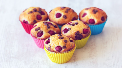 Group of delicious muffins placed on table
