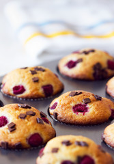 Delicious muffins placed in black tray