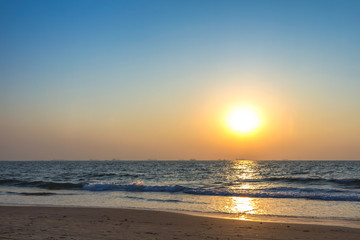 Fototapeta na wymiar Sunset at sea beach