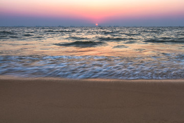 Obraz premium Sunset at sea beach