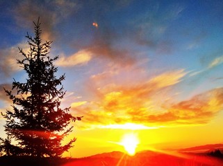 Obraz na płótnie Canvas Sunrise on the top of the mountain