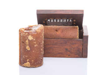 Brown coconut sugar in a wooden box 