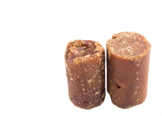 Brown coconut sugar over white background
