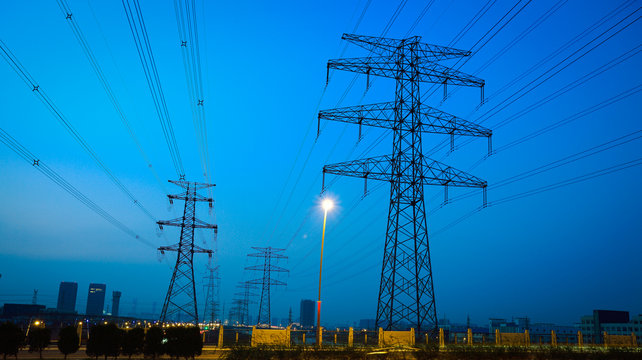 the high voltage electricity pylon in side of highway