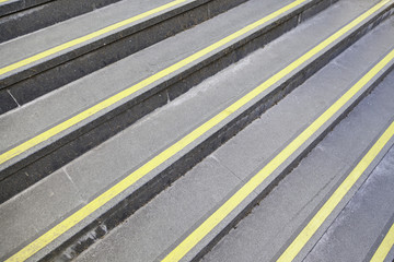 Steps with yellow signs