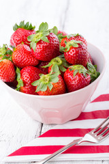 Strawberry in the pink bowl.