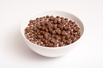 Breakfast Bowl With Chocolate Balls Corn Flakes And Milk - 64256800