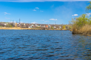 Fototapeta na wymiar Seasonal landscape with small Ukrainian river Sura