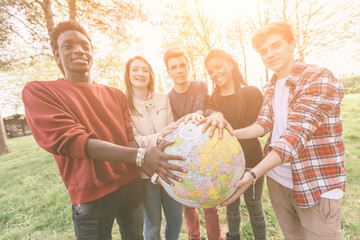 Group of Teenagers Holding World Globe Map