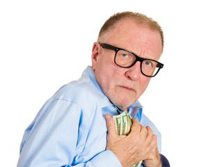 Portrait, headshot Stingy senior man, holding, smelling money