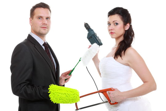 Young couple bride groom household chores isolated