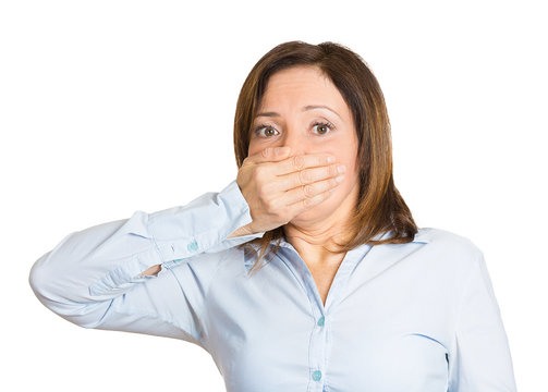 Speak no evil, woman covers her mouth as someone shut her up