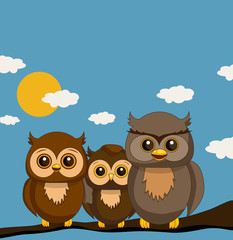 Owl family sitting on stick during sunny summer day